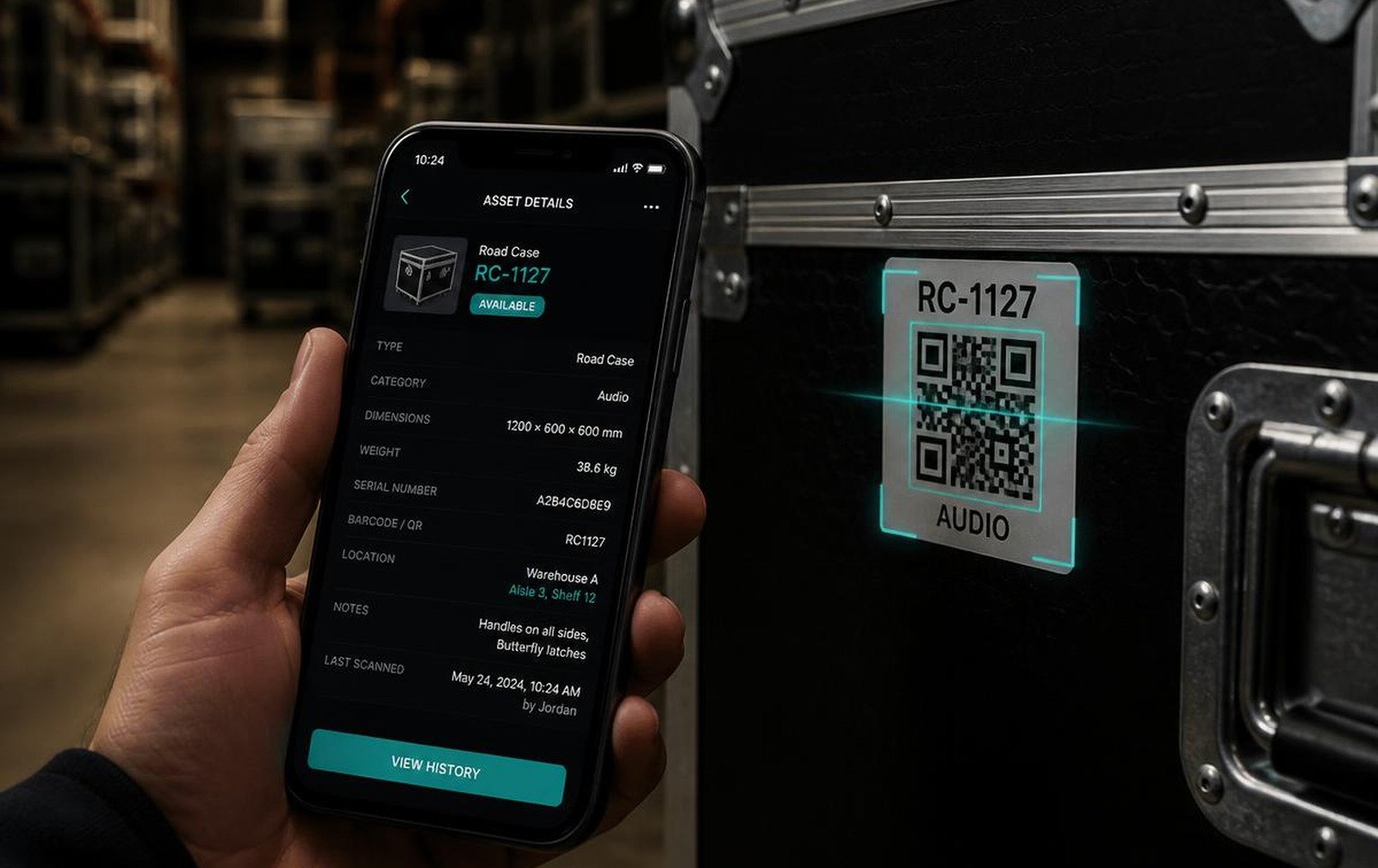 Crew member scanning a QR label on a road case with the Show Recon mobile view